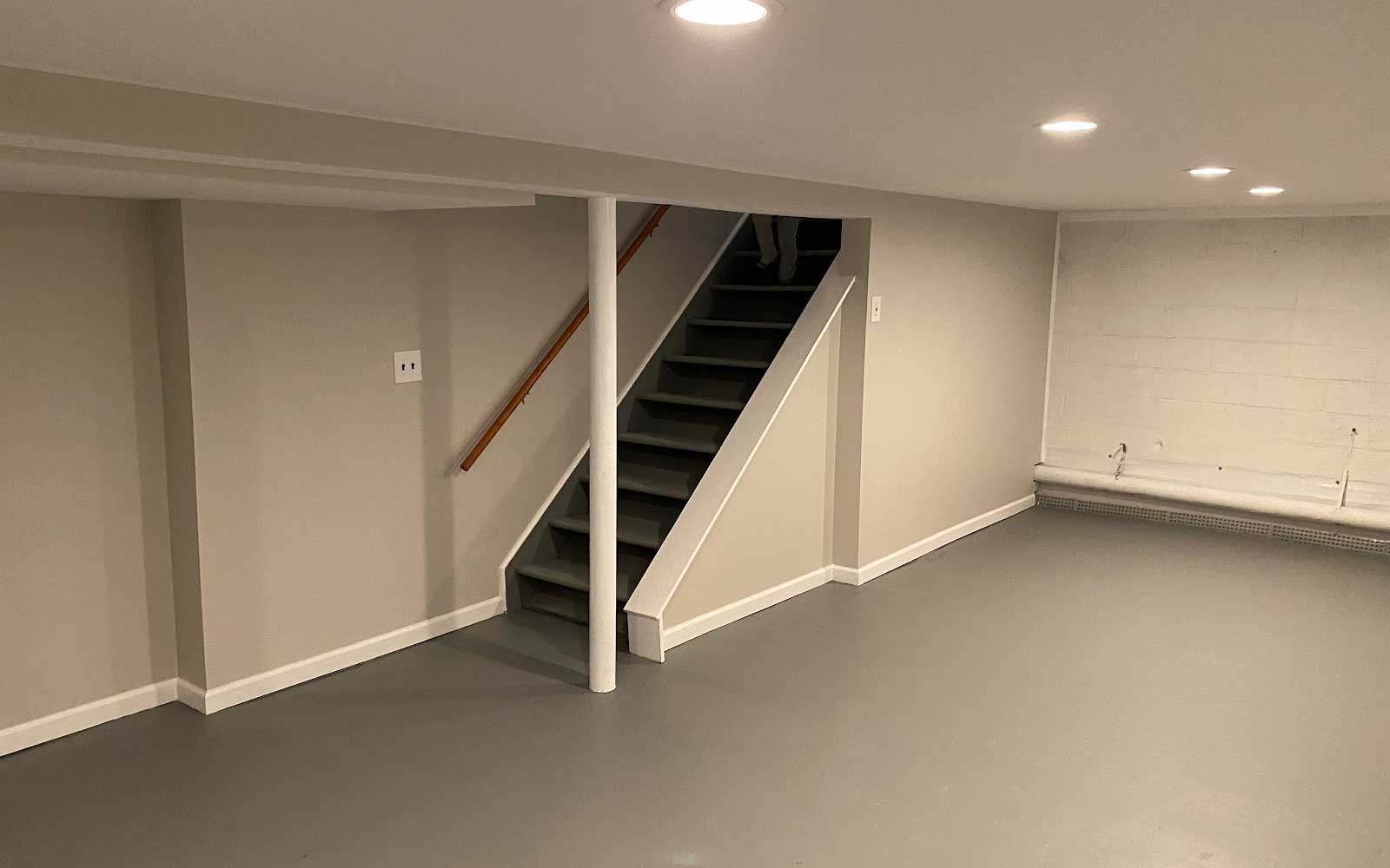 finished dry basement after waterproofing and remodeling