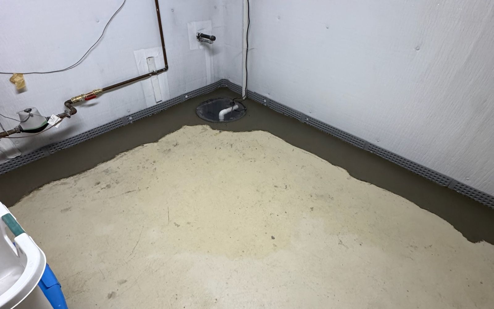 user-inserted Standing water near sump pump showing basement water problem
